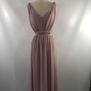 A mauve prom dress with gold belt